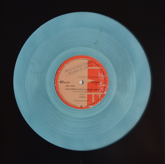 Crazy Little Thing Called Love / Bicycle Race (Long version) - EMI 446-1032 COLOMBIA (1979) ~ Light blue vinyl. Labels in Spanish